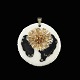 Royal 
Copenhagen / A. 
Michelsen. 
Porcelain and 
Gilded Sterling 
Silver Pendant.
Designed and 
...