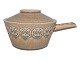 Kronjyden Bauta 
stoneware, 
lidded pot.
Designed by 
Henning Jensen 
around 1957 to 
1958 and ...