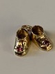 Baby shoes with 
red stone 
Pendants/charms 
14 carat gold
Stamped 585
Height 18.00 
mm ...