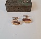 Pair of classic 
cufflinks in 
gold-plated 
sterling silver 

Stamped 925s - 
HS
Dimension on 
the ...