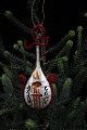 Old glass 
Christmas 
ornament in the 
form of a 
mandolin 
from around 
the 30s. H:15 
cm.