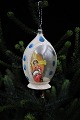 Old glass 
Christmas 
ornament with 
religious image 
from around 
1920-40. 
H:9,5cm.