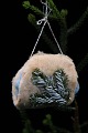 Old cotton wool 
Christmas 
ornament in the 
form of a muff 
from around 
1920-30. 7x9cm.