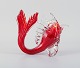 Large red 
Murano fish in 
mouth-blown art 
glass, 
1960s/70s.
H 25.0 cm. x L 
25.0 ...