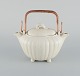 Gunnar Nylund 
for Rörstrand. 
Double jug in 
glazed ceramic. 

Cream colored 
eggshell glaze 
and ...