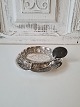 Oriental tea 
strainer on 
tray in 
sterling 
silver. 
Stamped: 
Sterling 
silver. 
Diameter on 
the ...