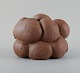 Christina Muff, 
Danish 
contemporary 
ceramicist (b. 
1971). 
Golden brown 
unglazed 
stoneware clay 
...