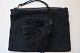 Antik crocketed 
handbag
The closing is 
made by a 
zipper and a 
tassel
With fabric 
and a little 
...