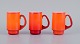 Michael Bang 
for Holmegaard.
Three mugs in 
orange and 
white art 
glass.
1960s.
In perfect ...