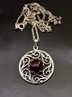 Sterling silver 
pendant D. 3 
cm. with amber 
and chain 49 
cm. subject no. 
523820