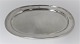 Sasikov. 
Russia. Saint 
Petersburg. 
Oval silver 
tray with 4 
feet (84). 
Crowned 
monogram. 
Length ...