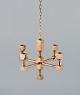 Gusum Metall, 
Sweden, 
chandelier in 
solid brass for 
four candles.
Swedish ...