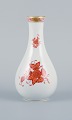 Herend, 
Hungary, 
porcelain vase, 
hand painted 
with orange 
flowers.
Mid 20th 
century.
Perfect ...