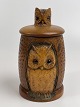 Handmade 
tobacco jar / 
lid jar in wood 
with carved owl 
in relief. A 
smaller owl 
head is carved 
...