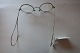An old pair of 
glasses incl. 
etui
These pair of 
glases has a 
"butterfly" 
behind the ears 
- ...