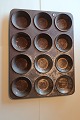 An old baking 
tin made of 
metal
12 items on 
one tin
In a good 
condition
Articleno.: 
4-910161