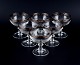 Murano, Italy, 
six mouth-blown 
engraved 
champagne 
glasses with 
silver rim.
Mid 20th ...