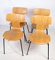 Set of four, 
model 3103, 
'T-chair', by 
Arne Jacobsen 
1902-1971 with 
bent veneered 
oak shell, ...