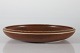 Carl-Harry 
Stålhane
Large low Bowl 
of stoneware
with glaze in 
brown notes
Sign. CHS for 
...
