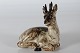 Royal 
Copenhagen 
Figurine
Deer no. 22607
decorated with 
light brown 
sung glaze
With stamp ...
