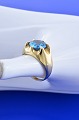 Gold 14 carat, 
Beautiful 
lady's ring cut 
blue stone. 
Ring Size 49.5 
=  15.7 mm. 
Stamped 585 SH. 
...