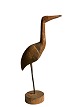 Sculptural and 
decorative bird 
/ decoy carved 
from wood and 
standing on a 
wooden stand. 
...