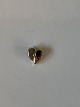 Heart pendant 
in 14 Karat 
gold and white 
gold with 
Brillant
Measures 
9.80*9.14 mm 
...