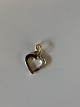 Brilliant heart 
pendant in Gold 
#14 carat
Stamped 585
Height 13.23 
mm approx
Width 10.32 mm 
...