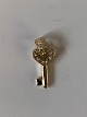 Key pendant in 
Gold #14 carat
Stamped 585
Height 27.62 
mm approx
Wide 10.67 mm 
approx
The ...