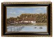 Painting on the 
canvas in an 
antique frame 
of a farmhouse 
and water from 
around the ...