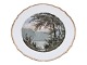 Royal 
Copenhagen 
White Curved 
with gold edge, 
luncheon plate 
decorated with 
landscape.
This ...
