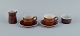 Stig Lindberg 
for 
Gustavsberg, 
COQ, two coffee 
cups with 
saucers, cream 
jug and sugar 
...
