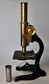 Antique 
microscope, 
19th/20th 
century. 
Germany. Mark: 
E. Leitz, 
Wetzlar, no. 
170144. Cast 
iron ...