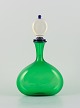 Gabbiani, 
Venice, Italy. 
Green art glass 
decanter with 
matching 
stopper. 1980s.
Label.
In ...