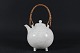 Gunnar Nylund
Ball shaped 
teapot with 
speckled 
sand colored 
glaze and cane 
handle
Height ...