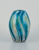 Italian glass 
artist, unique 
art glass vase 
in modernist 
design. 
Circa 1980s. 
Signed Melino 
...