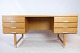 The oak desk, 
model EP-401, 
designed by Kai 
Kristiansen and 
Eigil Pedersen 
in 1960, is a 
unique ...