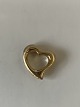 Heart pendant 
in 14 carat 
gold
Stamped 585
Goldsmith: 
Unknown
Height 15.44 
mm approx
Width ...