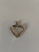Heart pendant 
in 14 carat 
gold
Stamped 585
Goldsmith: 
Unknown
Height 18.08 
mm approx
Width ...
