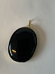 Black Onyx 
Pendant in 18 
carat Gold
Cabochon cut
Stamped 750
Height 4.7 cm 
approx
The item ...