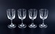 A set of four 
René Lalique 
Chenonceaux red 
wine glasses.
Clear 
mouth-blown 
crystal glass 
with ...