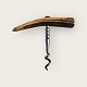 Older corkscrew 
with a handle 
made of deer 
antler. 
Dimensions: 9x8 
cm