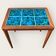 Teak table with 
tiles in strong 
blue / green 
colours. Danish 
modern from the 
1960s. A few 
minor ...