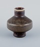 Carl Harry 
Stålhane for 
Rörstrand 
Atelje, a 
ceramic vase in 
a rare form 
with 
brownish-green 
...