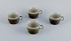 Marianne 
Westman for 
Rörstrand, 
"Maya", a set 
of four coffee 
cups in 
stoneware with 
green-brown ...