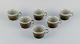 Marianne 
Westman for 
Rörstrand, 
"Maya", a set 
of six coffee 
cups in 
stoneware with 
green-brown ...