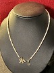 Real pearls, 
with 
gold-plated 
silver, 925 
together with 
silver pendant 
starfish in 
925, size 49 cm