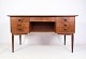This desk in 
teak wood from 
around the 
1960s is a 
beautiful 
example of 
Danish design 
aesthetics ...