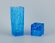 Gullaskruf, 
Sweden, 
square-shaped 
glass vase and 
candlestick in 
blue art glass.
Modernist ...