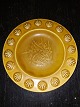 Ceramic tray 
with yellow 
glaze. 
Decorated with 
hedgehogs and 
seashells on 
the edge. 
Designed by ...